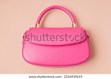 Pastel colored womens hand bag on pink background. Summer fashion concept. Mockup Royalty-Free Stock Photo #2316939619