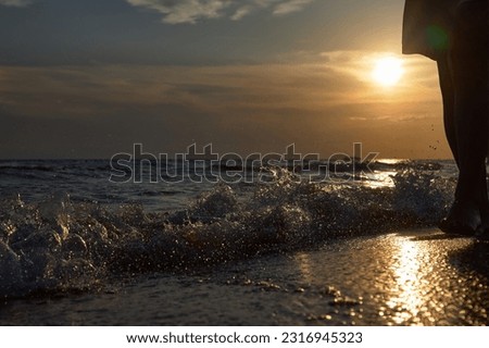 Orange-gold sunset, sky, sunlight, summer mood landscape with sea sunset on beach