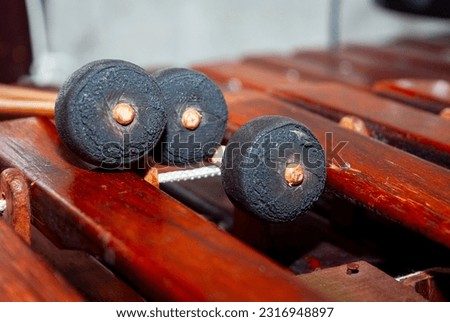 Marimba keyboard made of Hormigo wood, the national instrument of Guatemala, melodies and traditional sound in todaca for men at a party or celebration. Royalty-Free Stock Photo #2316948897