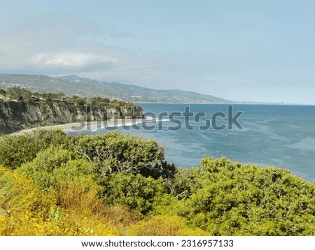 Point dume state beach headland cliffs, Rocky coves and wide beach access which overlooks broadwalks , trails for public use  Royalty-Free Stock Photo #2316957133