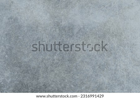 Grey stone abstract background surface for food or product presentation; light blue hue flat lay photography backdrop; 