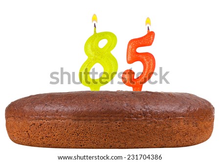 birthday cake with candles number 85 isolated on white background