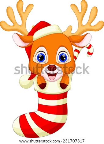 Cute baby deer in the socks with christmas red hat
