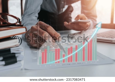 Businessman using smat phone analyzing sales data and economic growth graph chart. Business investment strategy. Abstract icon. Digital marketing.