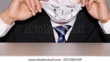 Image of a crying businessman