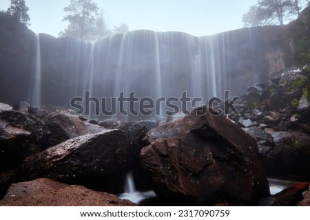 waterfall with mist in summer, foggy forest with rain in mexiquillo durango 