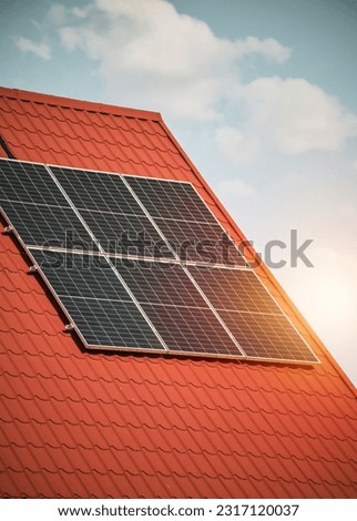 Solar panels on the roof of the modern house. Residential house cottage with blue shiny solar photo voltaic panels system on roof. Renewable ecological green energy production concept. Sustainable. Royalty-Free Stock Photo #2317120037