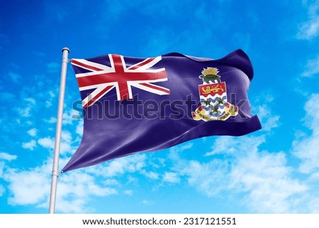 Cayman Islands flag waving in the wind, blue sky background