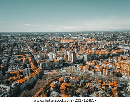 Aerial view of city skyline of Milan. Modern glassy skyscrapers in the business centre of the city. Beautiful Aerial Footage. 
