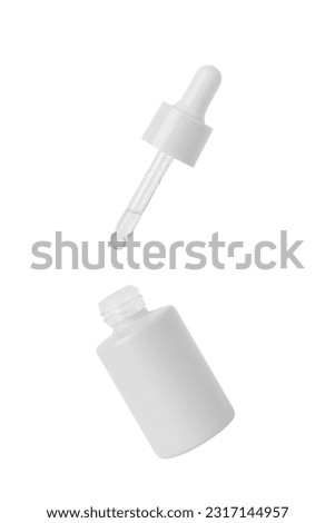 Gray cosmetic jar with dropper. On a white background.