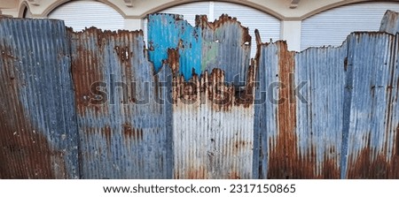 Old zinc vintage fence wall texture for background, pattern of rusty on metal panel.Tin Roof wall countryside
