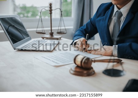 Lawyer or lawyer reading statute of limitations, consulting between male lawyers and business clients, tax firms and law and law firms. Royalty-Free Stock Photo #2317155899
