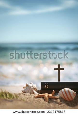 
Bible book, cross of Jesus Christ, conch and starfish on sea waves and sandy beach, church summer retreat and summer bible school summer camp
