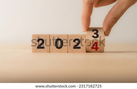 Starting new year 2024. Flipping of 2023 to 2024 on wooden cube blocks. Beginning and start of the new year 2024. Preparation for new year ,life, business, plan, goals, target and strategy concept.  Royalty-Free Stock Photo #2317182725