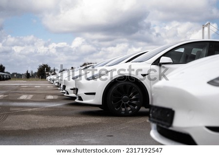 Electric vehicles on a public parking