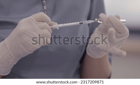 Syringe, Medical Injection in Hand. Patient Being Given an Injection by a Doctor.