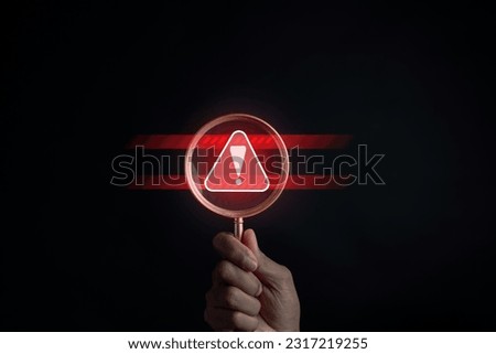 Scammer alert and warning caution signs. cyber attack on online network error system. Cybersecurity vulnerability, data breach, illegal connection, compromised information. Royalty-Free Stock Photo #2317219255