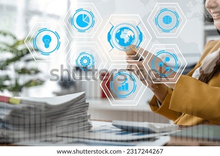 Business robotic process automation concept with icons of management, document validation, information in connected gear cogs, businessman touching screen mobile phone