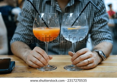 Man with glass of wine at restaurant