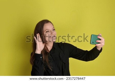smiling woman with cell phone
