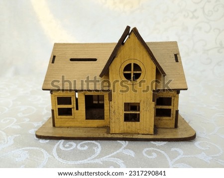 A photo of Miniature old house made of wood