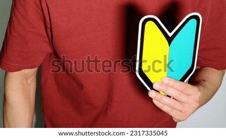 A person with a beginner mark Royalty-Free Stock Photo #2317335045