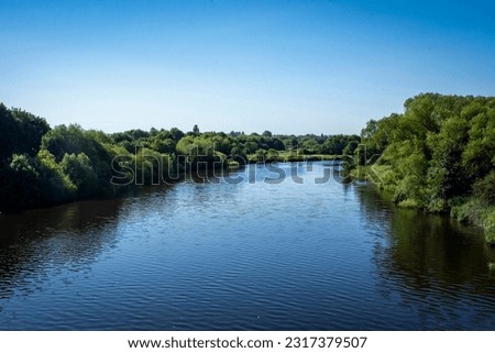 View of river tees with many tress on river banks-001 Royalty-Free Stock Photo #2317379507