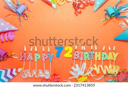Top view birthday background with number  72. A beautiful holiday postcard on a colorful background with decorations. Anniversary congratulations with a number. Words from candles birthday.