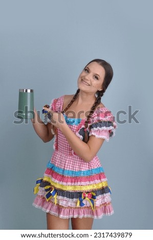 beautiful woman with colorful dress and beer mug