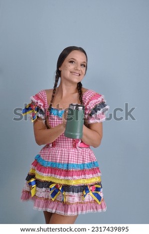 beautiful woman with colorful dress and beer mug