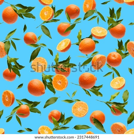 beautiful seamless pattern of tangerines with leaves and cuts on the blue background