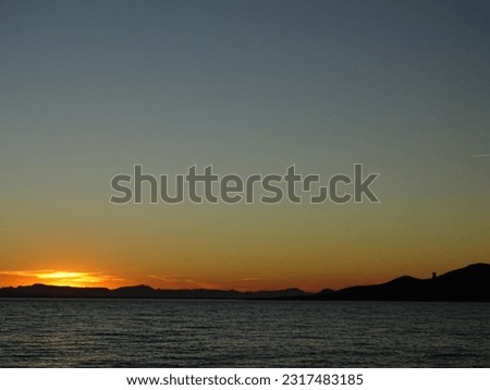 A beautiful sunset in Mar Menor, La Manga (Murcia). View to the Baron's Island