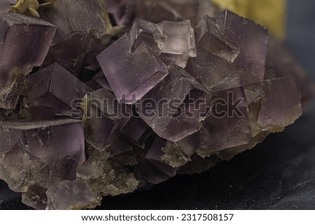 Violet fluorite, macro detail, texture background. semi-precious gemstone Royalty-Free Stock Photo #2317508157