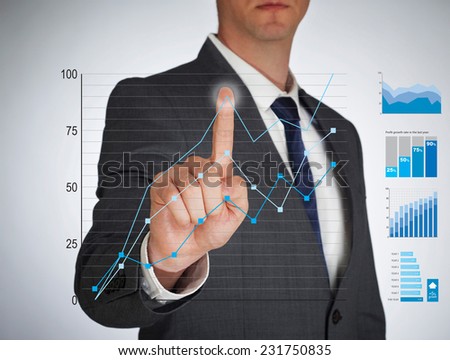 Businessman touching a virtual screen