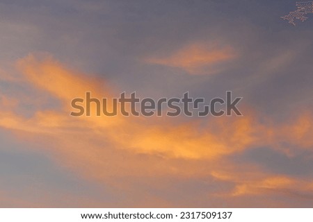 Sunset sky orange color clouds background nature in the evening summer.