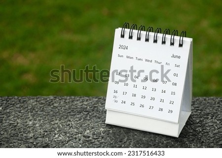 June 2024 table calendar with customizable space for text. Copy space and calendar concept