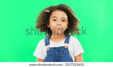 Raise eyebrow, green screen and face of child on in studio for comic, meme and funny facial expression. Emoji mockup, childhood and portrait of young girl with happiness, humour reaction and excited