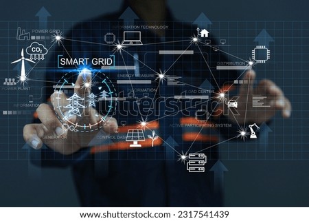 electric power Industry with electrical engineers using virtual screen presses inscription smart grid. Industrial and smart city network. Renewable Energy Smart Grid Technology engineering concept Royalty-Free Stock Photo #2317541439
