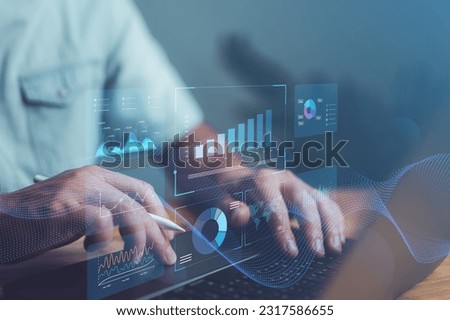 Businessman or Analyst working with Business Analytics and Data Management System on virtual screen, make a report with KPI and metrics. Corporate strategy for finance, operations, sales, marketing.