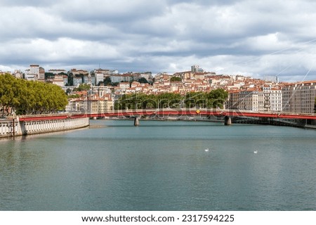 Pedestrian bridge on the Saone River, Lyon, Rhone department, France Royalty-Free Stock Photo #2317594225