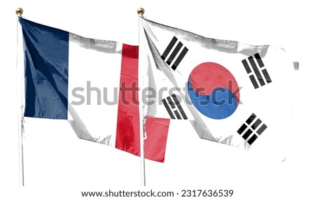 Flags of South Korea and France against the cloudy sky. waving in the sky
