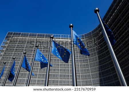 European flags in front of the Berlaymont building, headquarters of the European Commission in Brussels, Belgium Royalty-Free Stock Photo #2317670959