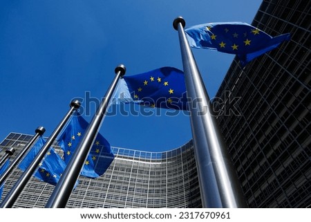 European flags in front of the Berlaymont building, headquarters of the European Commission in Brussels, Belgium Royalty-Free Stock Photo #2317670961