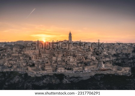Matera city skyline, the ancient town of Matera at sunrise or sunset, Matera, Italy Royalty-Free Stock Photo #2317706291