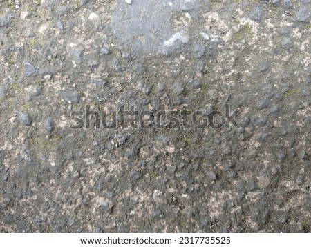 
black natural gravel wall background