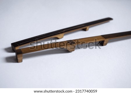 The karinding musical instrument is an ancient musical instrument from 
West Java, Indonesia, made of bamboo and has a distinctive sound with white background