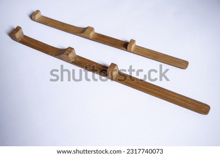 The karinding musical instrument is an ancient musical instrument from 
West Java, Indonesia, made of bamboo and has a distinctive sound with white background