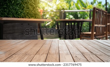 Beautiful wooden floor and cafe restaurant garden background