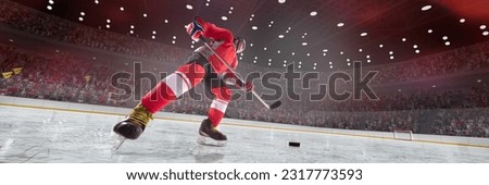 Young man, professional hockey player in uniform on 3D ice rink arena in motion with stick and puck. Blurred audience, fans on background. Concept of sport, competition, match, game, action and motion