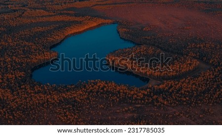 The most beautiful lake in Latvia at sunset. Purezers from above in the sunset light